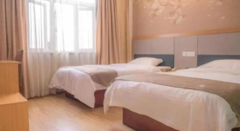 Bed in GreenTree Inn Zhejiang Ningbo Exhibition and Convention Center Bus East Station Express Hotel