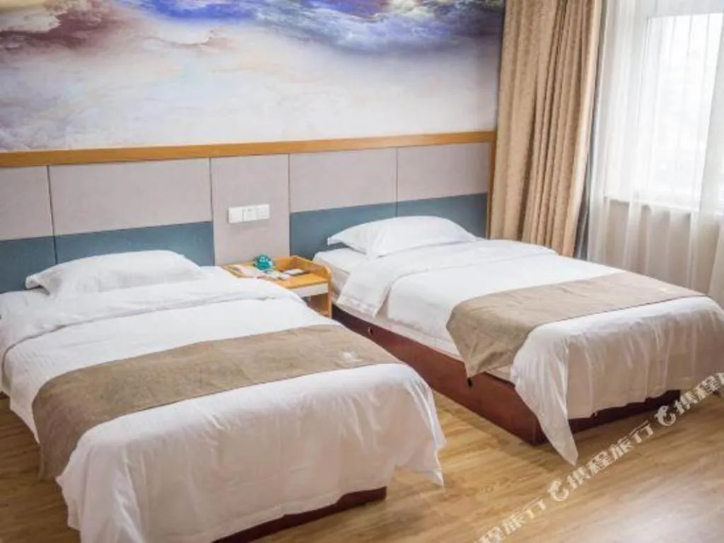Bed in GreenTree Inn Zhejiang Ningbo Exhibition and Convention Center Bus East Station Express Hotel