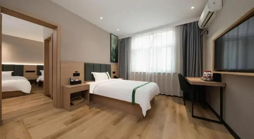 Bed in GreenTree Inn Zhejiang Ningbo Exhibition and Convention Center Bus East Station Express Hotel Bed in GreenTree Inn Zhejiang Ningbo Exhibition and Convention Center Bus East Station Express Hotel