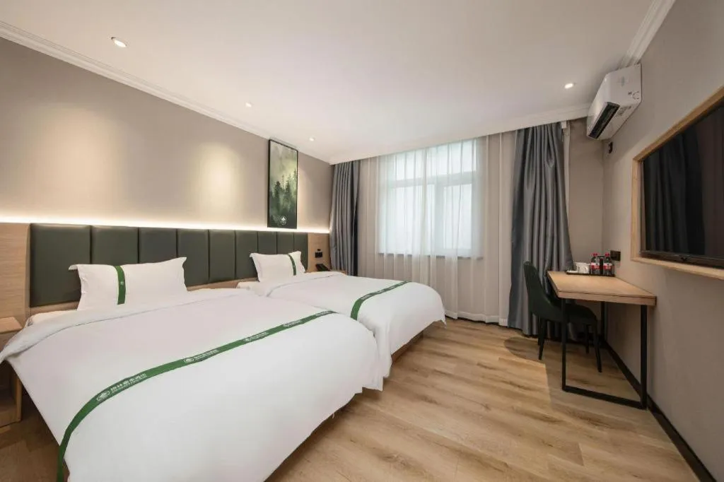 Bed in GreenTree Inn Zhejiang Ningbo Exhibition and Convention Center Bus East Station Express Hotel
