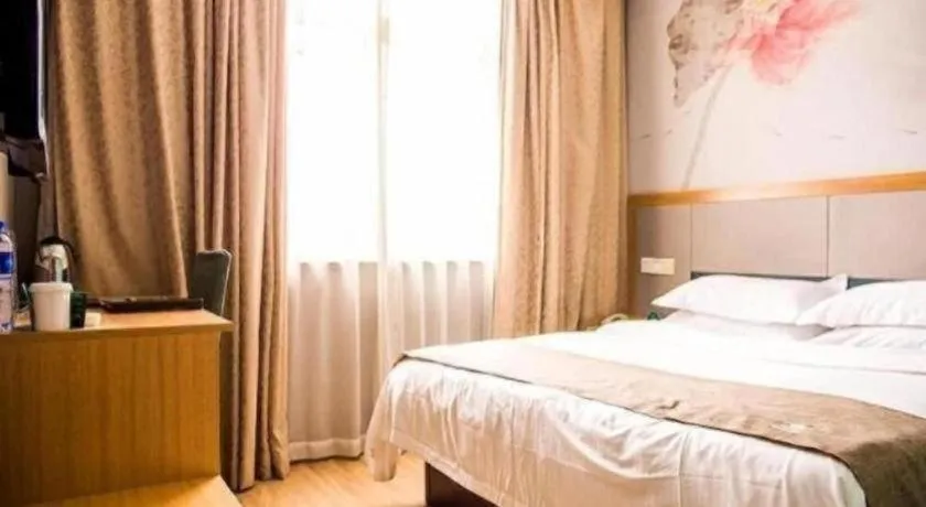 Bed in GreenTree Inn Zhejiang Ningbo Exhibition and Convention Center Bus East Station Express Hotel