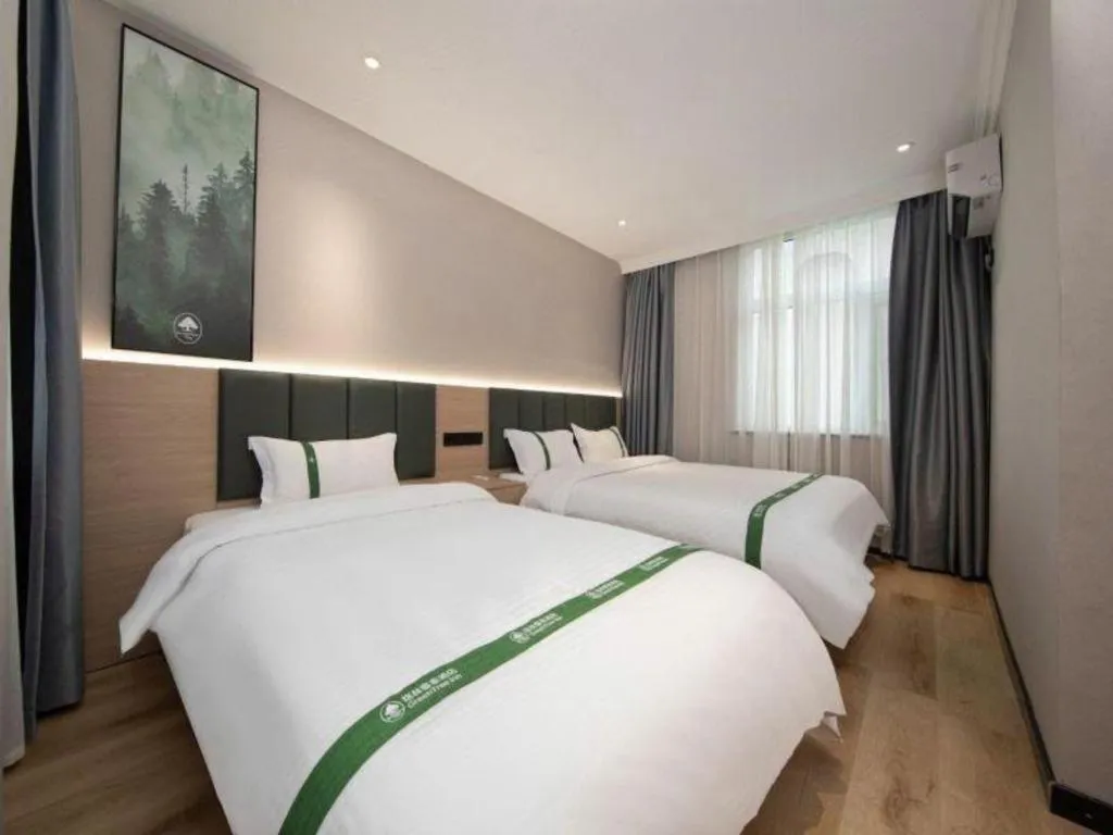 Bed in GreenTree Inn Zhejiang Ningbo Exhibition and Convention Center Bus East Station Express Hotel