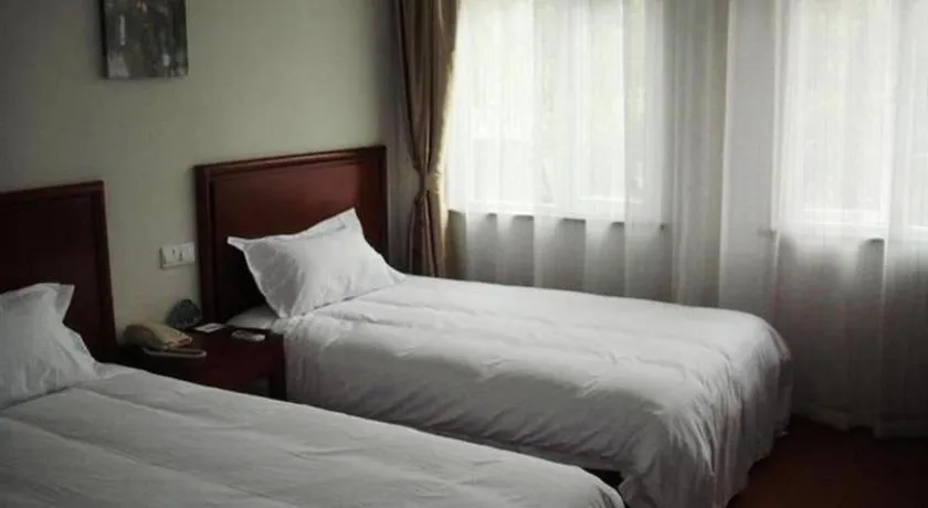 Bed in GreenTree Inn Zhejiang Ningbo Exhibition and Convention Center Bus East Station Express Hotel