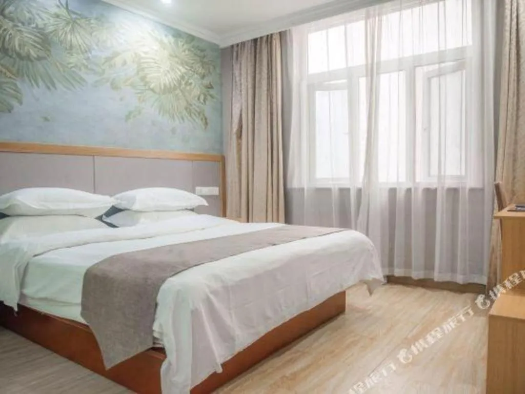 Bed in GreenTree Inn Zhejiang Ningbo Exhibition and Convention Center Bus East Station Express Hotel