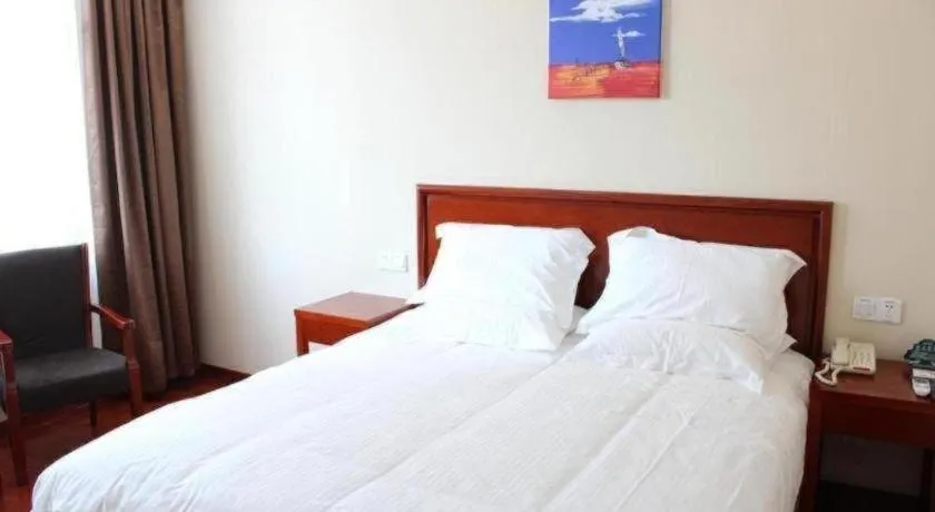 Bed in GreenTree Inn Zhejiang Ningbo Exhibition and Convention Center Bus East Station Express Hotel