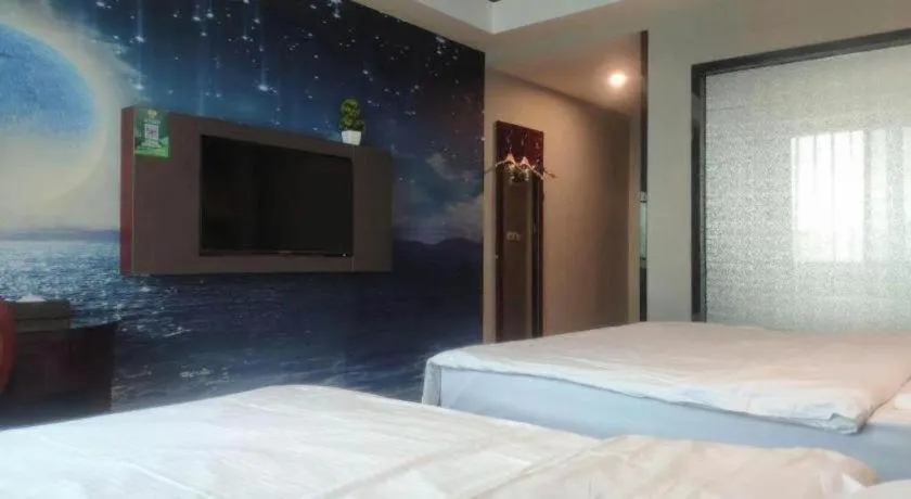 Bed in GreenTree Inn Guangzhou Baiyun International Airport Huaxi Road Express Hotel