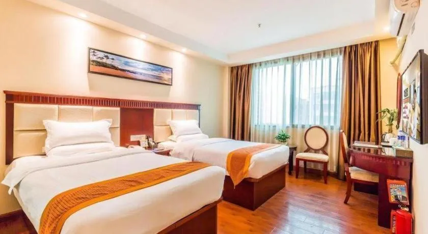 Bed in GreenTree Inn Guangzhou Baiyun International Airport Huaxi Road Express Hotel
