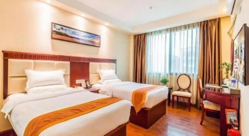 Bed in GreenTree Inn Guangzhou Baiyun International Airport Huaxi Road Express Hotel