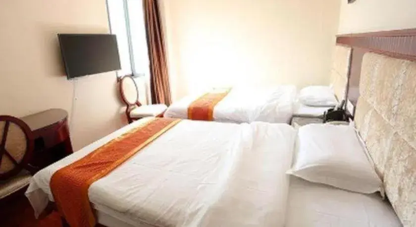 Bed in GreenTree Inn Guangzhou Baiyun International Airport Huaxi Road Express Hotel Bed in GreenTree Inn Guangzhou Baiyun International Airport Huaxi Road Express Hotel