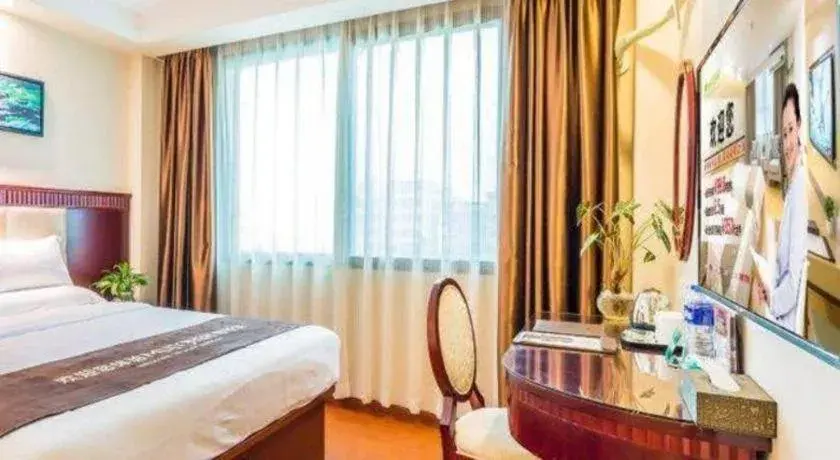 Bed in GreenTree Inn Guangzhou Baiyun International Airport Huaxi Road Express Hotel Bed in GreenTree Inn Guangzhou Baiyun International Airport Huaxi Road Express Hotel