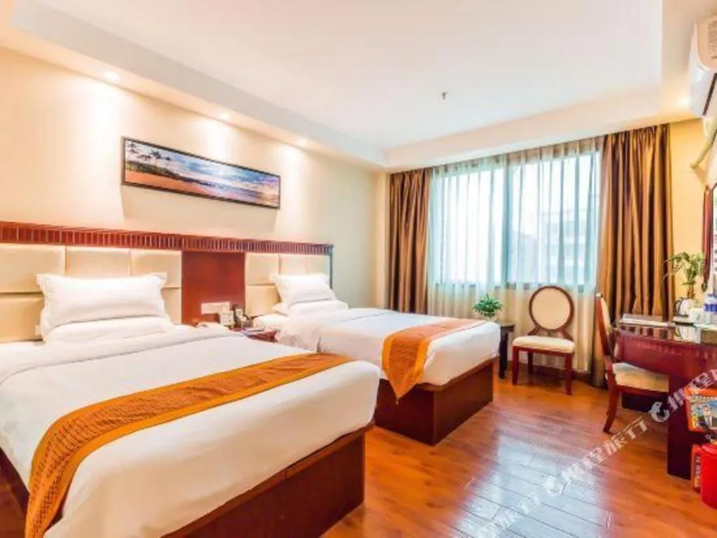 Bed in GreenTree Inn Guangzhou Baiyun International Airport Huaxi Road Express Hotel