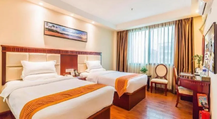 Bed in GreenTree Inn Guangzhou Baiyun International Airport Huaxi Road Express Hotel