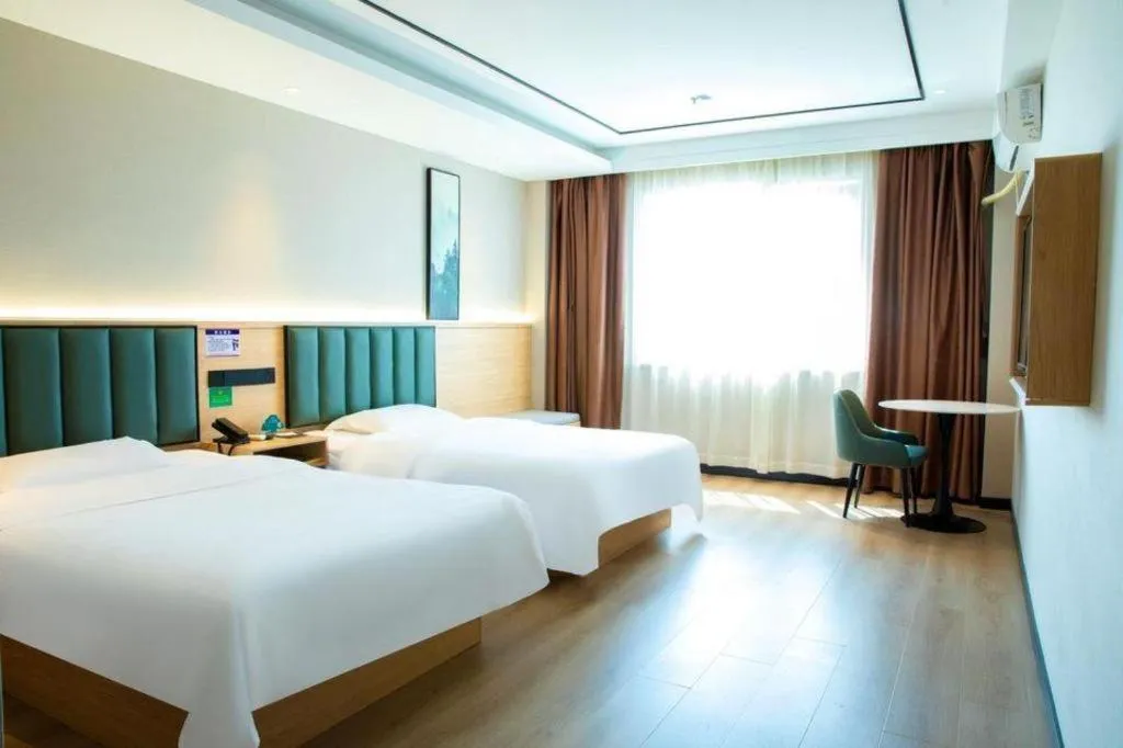 Bed in GreenTree Inn ShangHai KangQiao Industrial Zone JinXiu Road Business Hotel