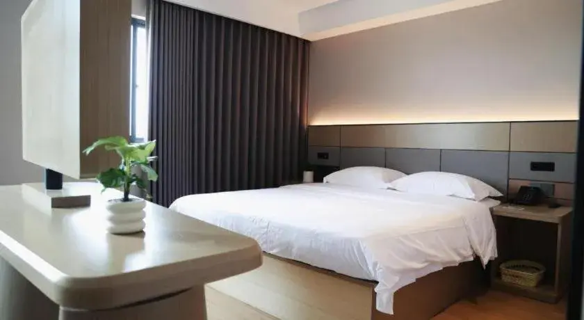 Bed in GreenTree Inn Suzhou Industrial Zone Yangcheng Lake Weiting Mong Kok Express Hotel Bed in GreenTree Inn Suzhou Industrial Zone Yangcheng Lake Weiting Mong Kok Express Hotel