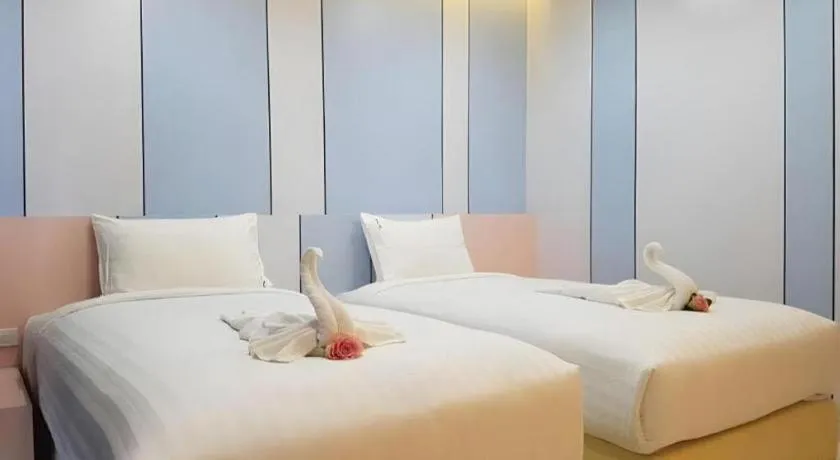 Bed in The Peak Boutique Hotel