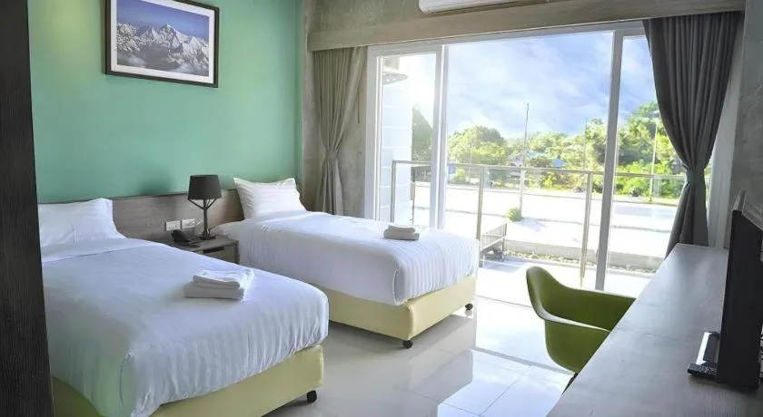 Bed in The Peak Boutique Hotel