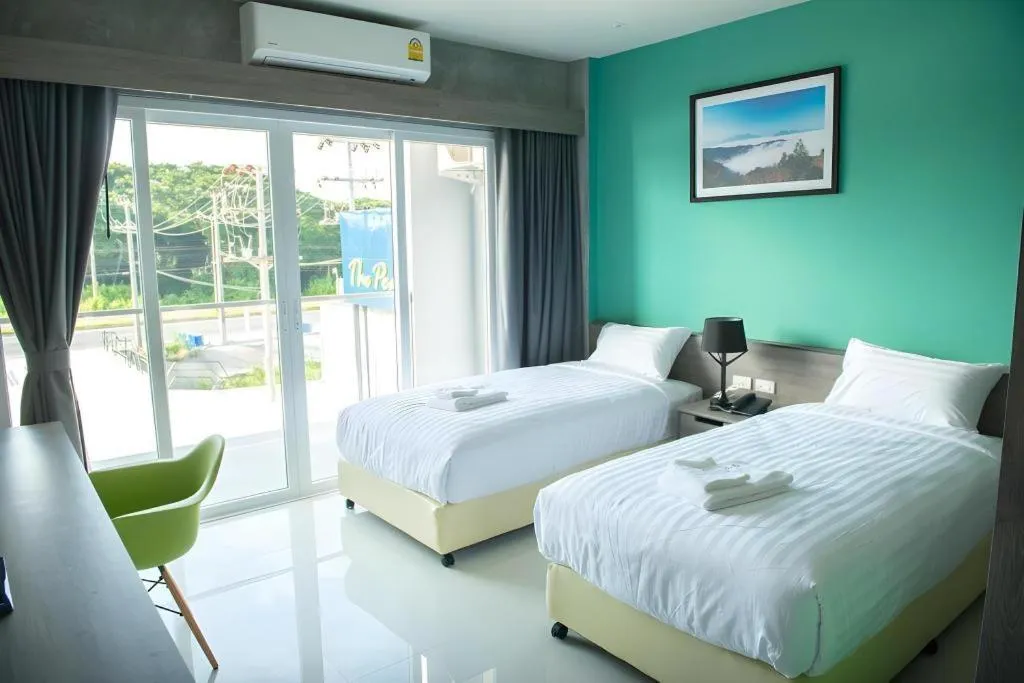 Bed in The Peak Boutique Hotel