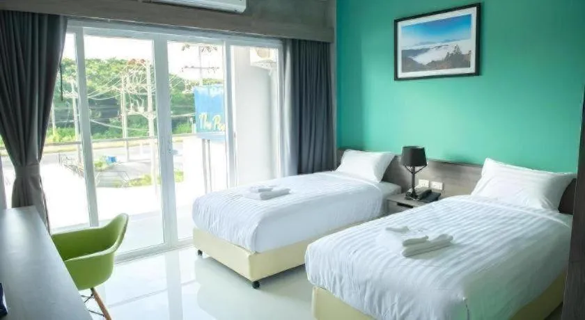 Bed in The Peak Boutique Hotel