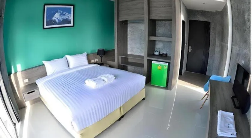 Bed in The Peak Boutique Hotel