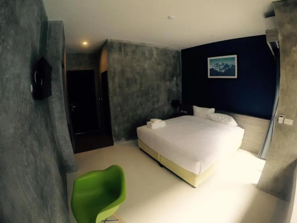 Bed in The Peak Boutique Hotel