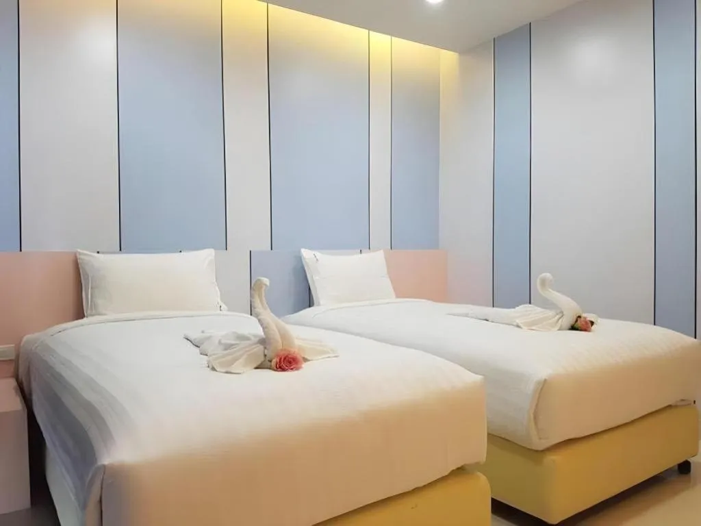 Bed in The Peak Boutique Hotel