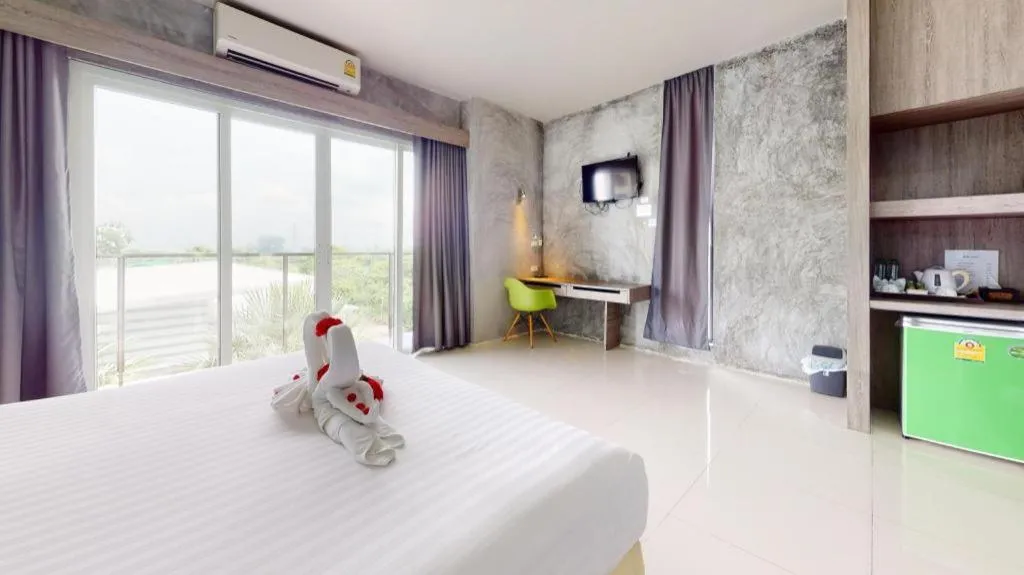 Bed in The Peak Boutique Hotel