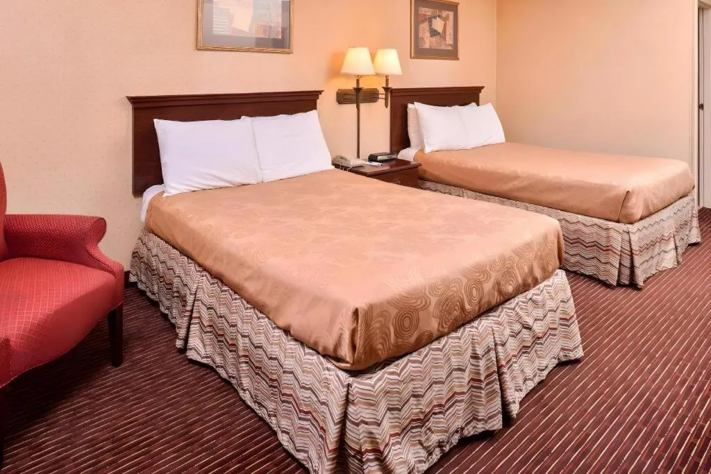Bed in Americas Best Value Inn Alliance