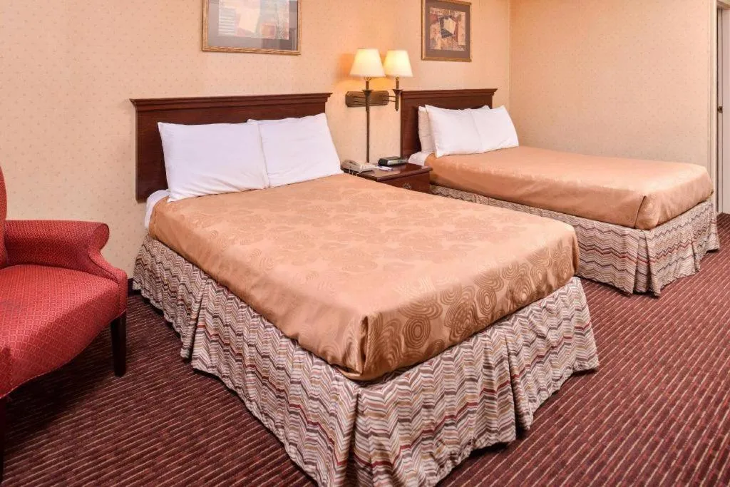 Bed in Americas Best Value Inn Alliance