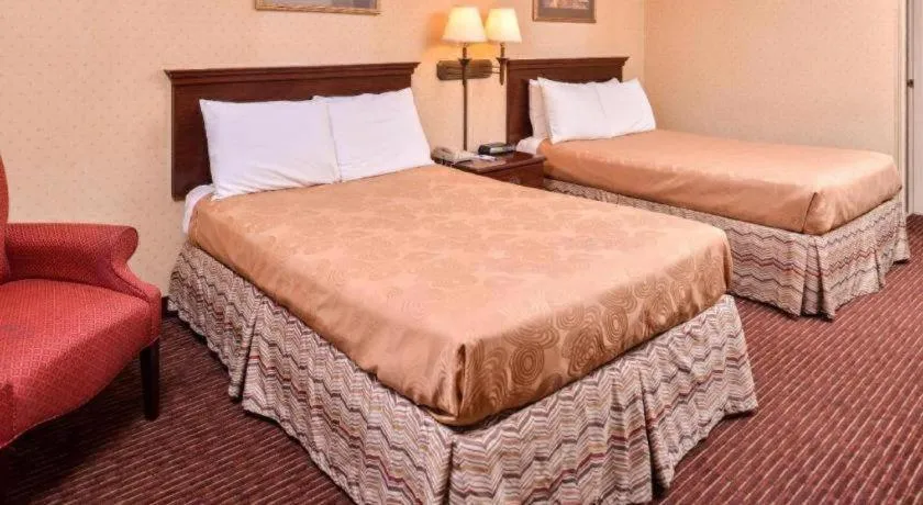 Bed in Americas Best Value Inn Alliance
