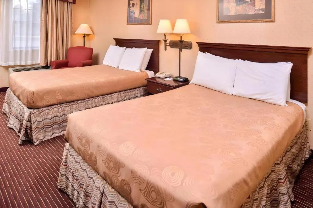 Bed in Americas Best Value Inn Alliance