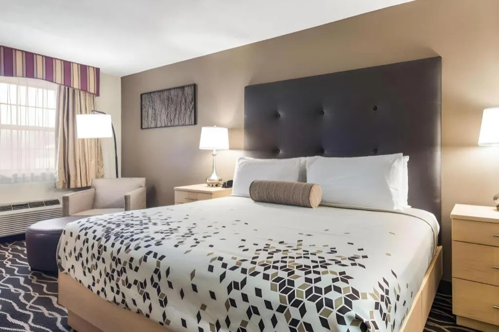 Bed in Americas Best Value Inn Alliance