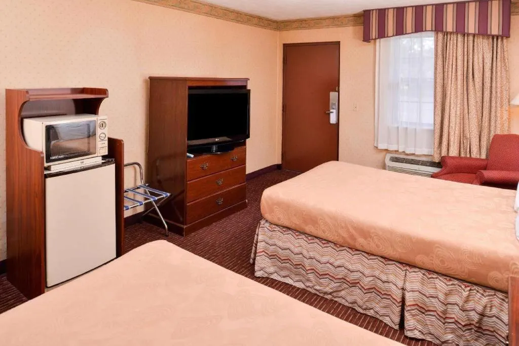 Bed in Americas Best Value Inn Alliance