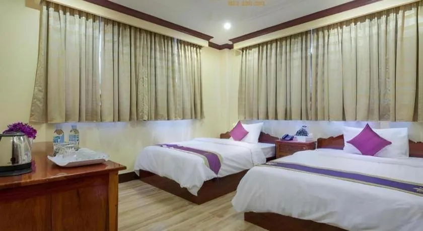 Bed in The Mou Hotel