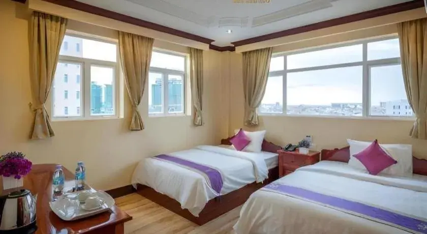 Bed in The Mou Hotel Bed in The Mou Hotel