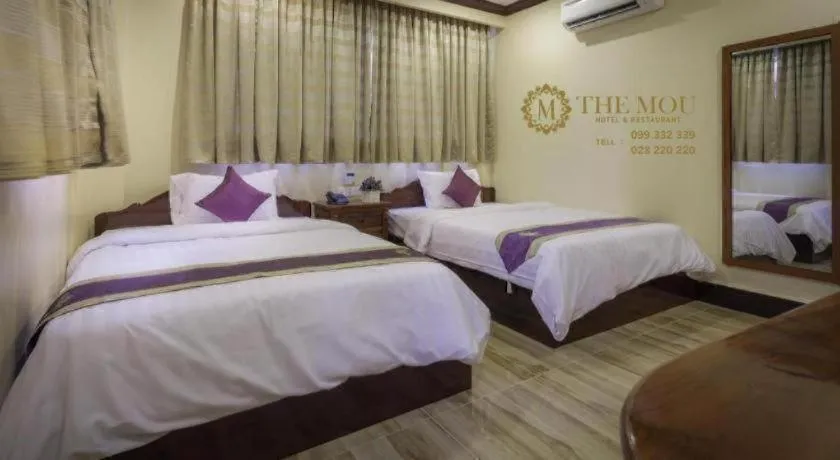 Bed in The Mou Hotel