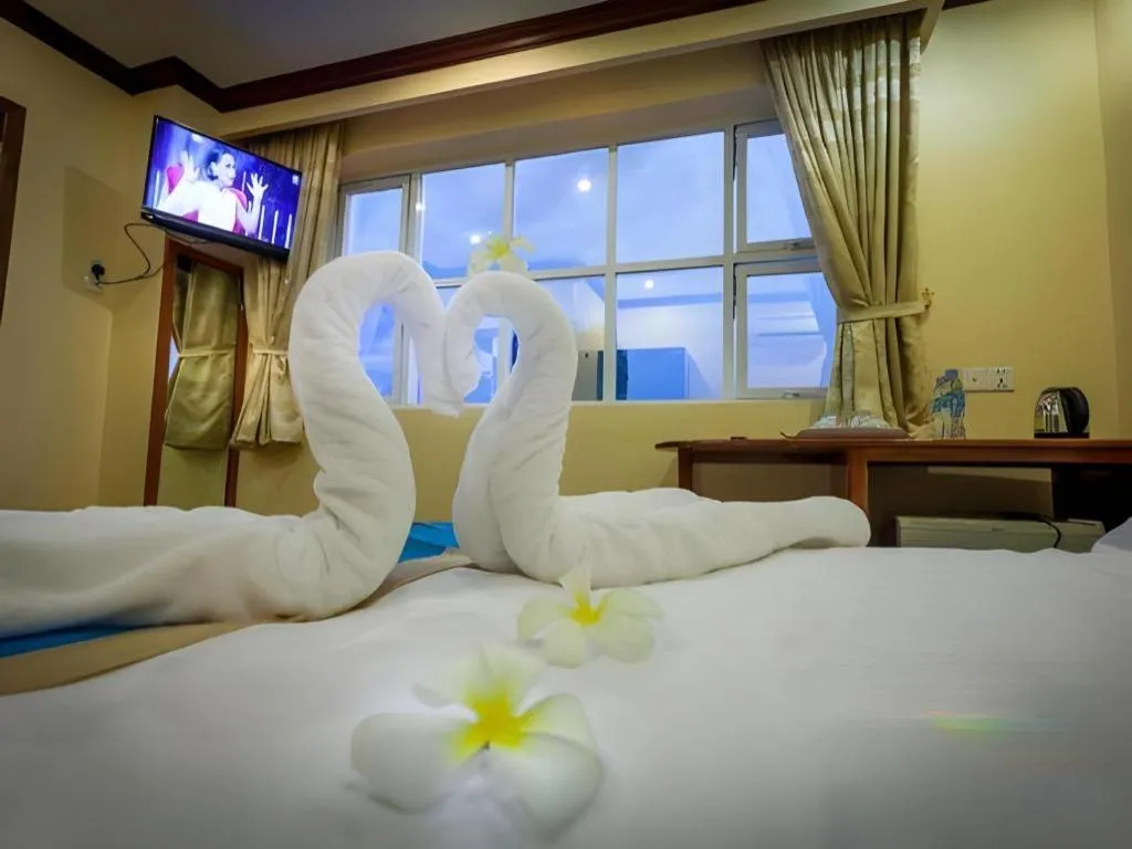 Bed in The Mou Hotel