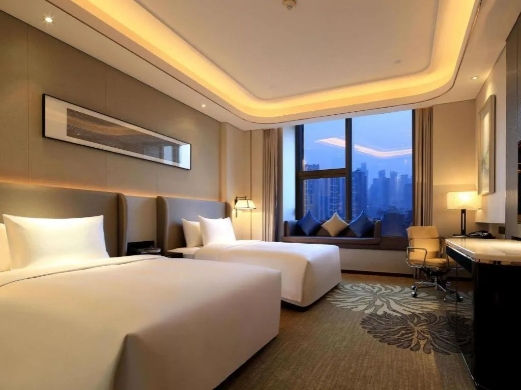 Bed in Wyndham Grand Plaza Royale Huayu Chongqing