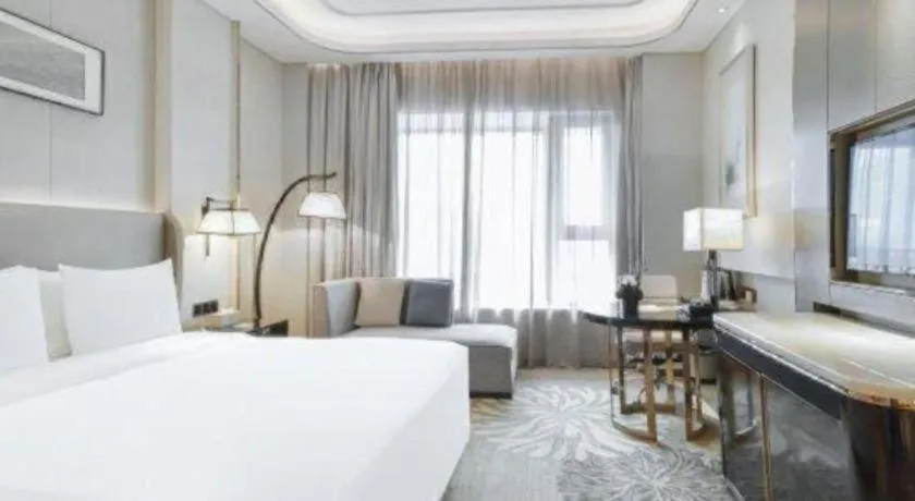 Bed in Wyndham Grand Plaza Royale Huayu Chongqing