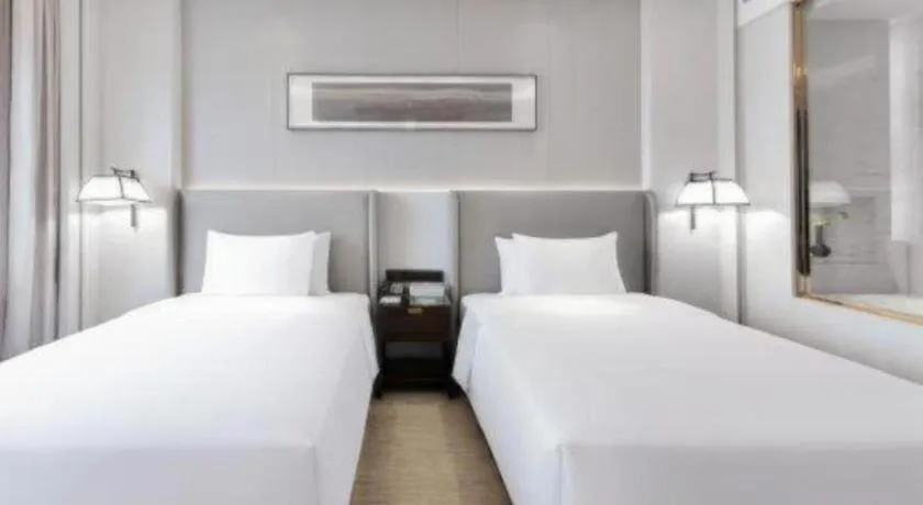 Bed in Wyndham Grand Plaza Royale Huayu Chongqing