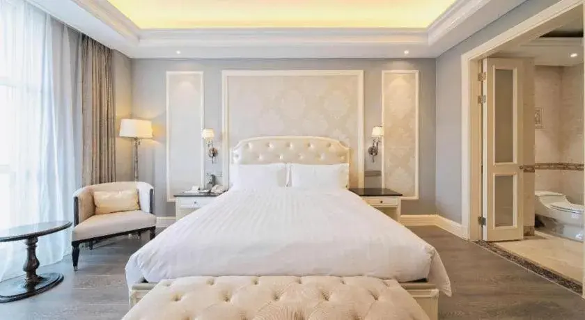 Bed in Yin Run Jin Jiang Castle Hotel Bed in Yin Run Jin Jiang Castle Hotel