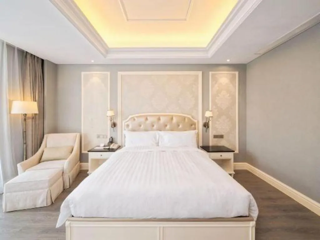 Bed in Yin Run Jin Jiang Castle Hotel