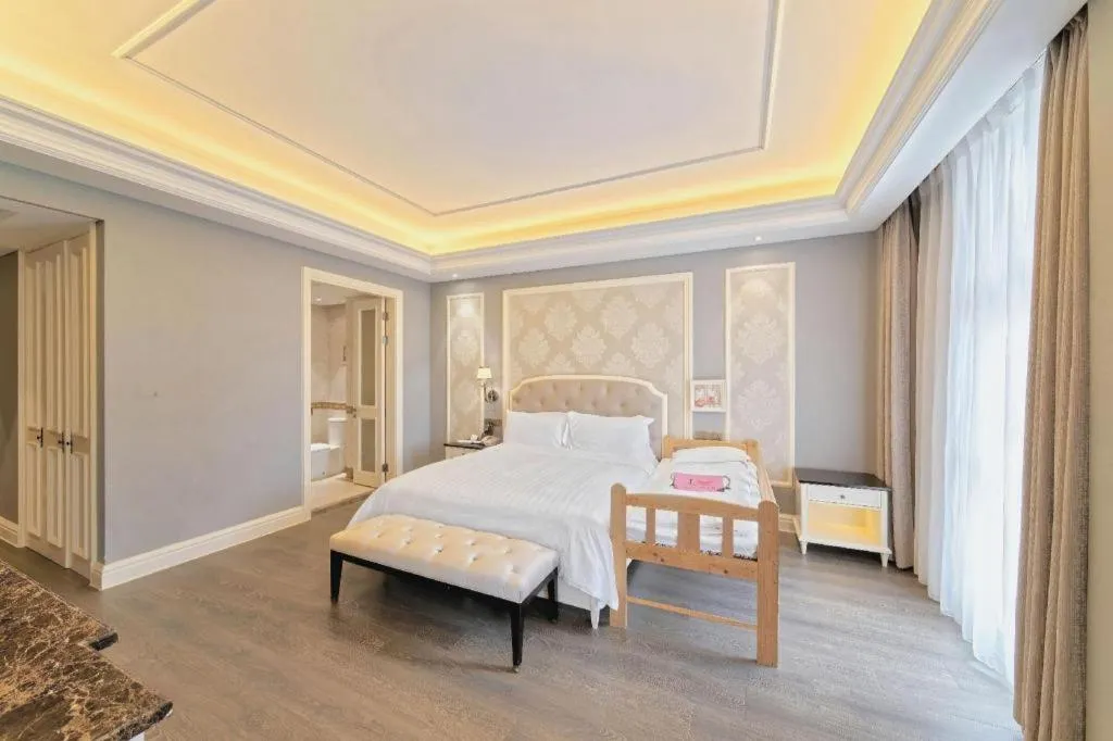 Bed in Yin Run Jin Jiang Castle Hotel