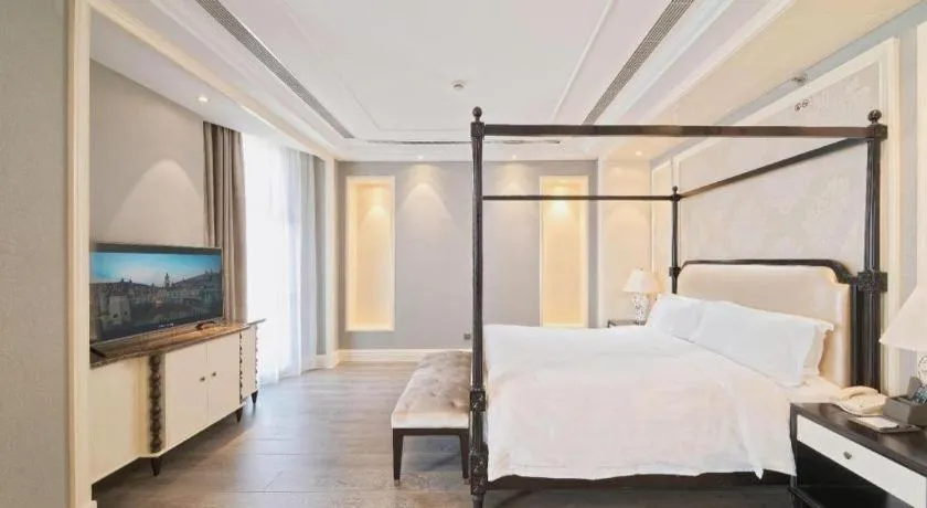 Bed in Yin Run Jin Jiang Castle Hotel