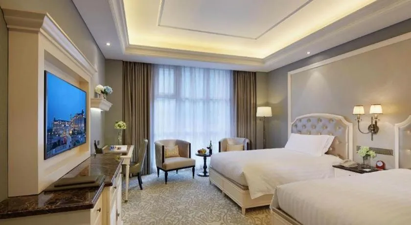 Bed in Yin Run Jin Jiang Castle Hotel