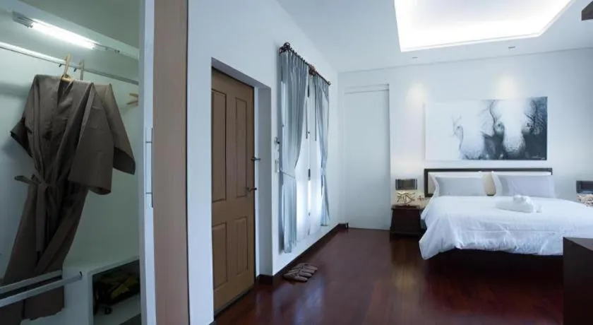 Bed in Doltara Boutique Resort