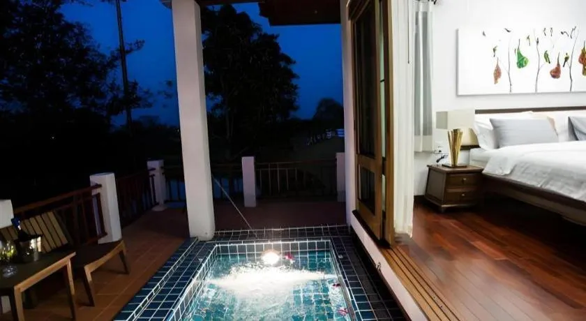 Bed in Doltara Boutique Resort