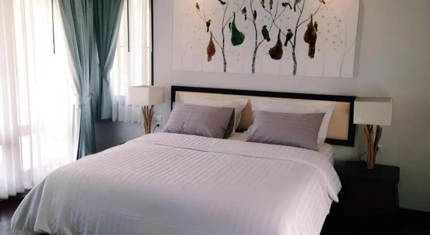 Bed in Doltara Boutique Resort