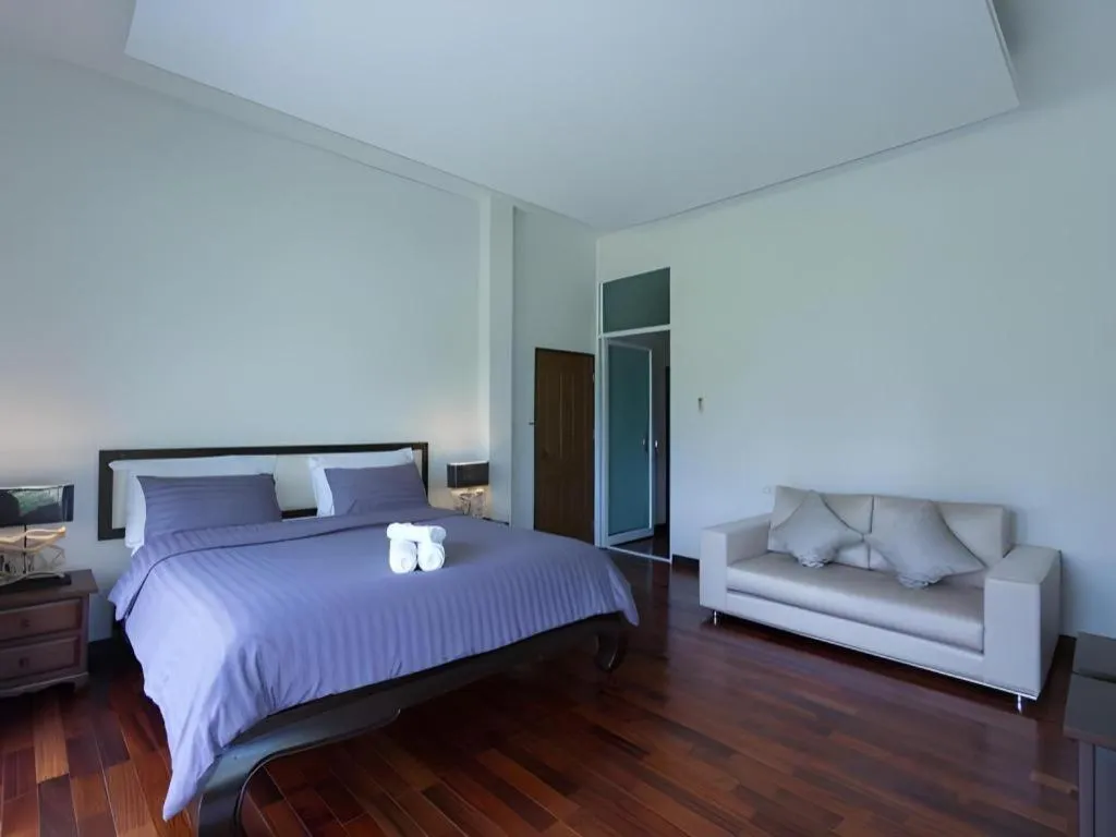 Bed in Doltara Boutique Resort