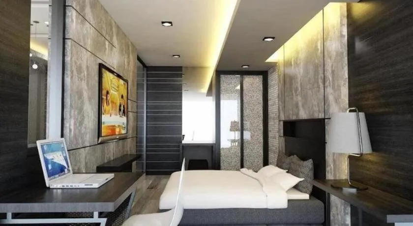 Bed in Alvarez Hotel