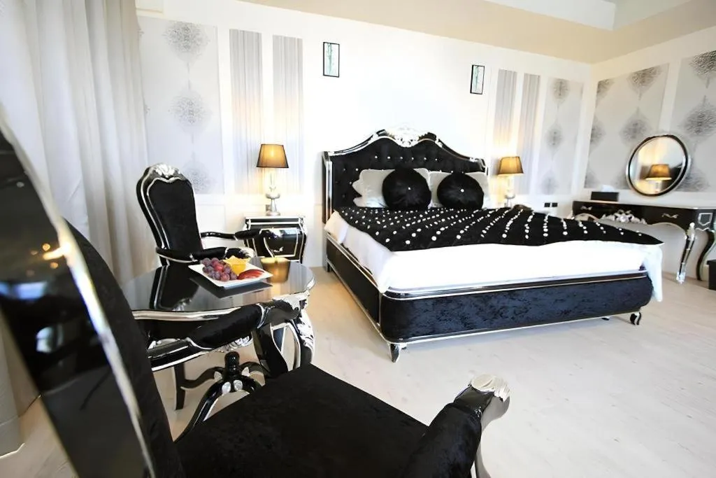 Bed in Alvarez Hotel